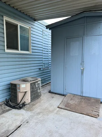 a view of front door and bedroom