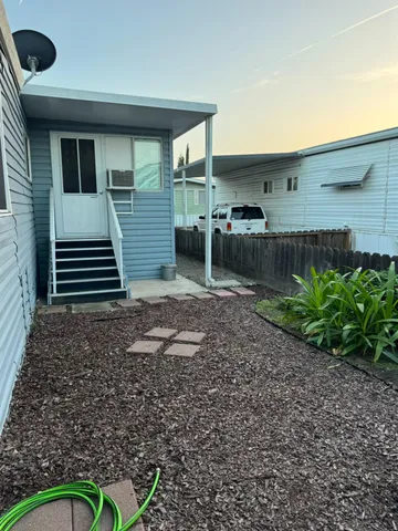 a view of a house with a patio