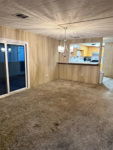 a view of a kitchen with a sink