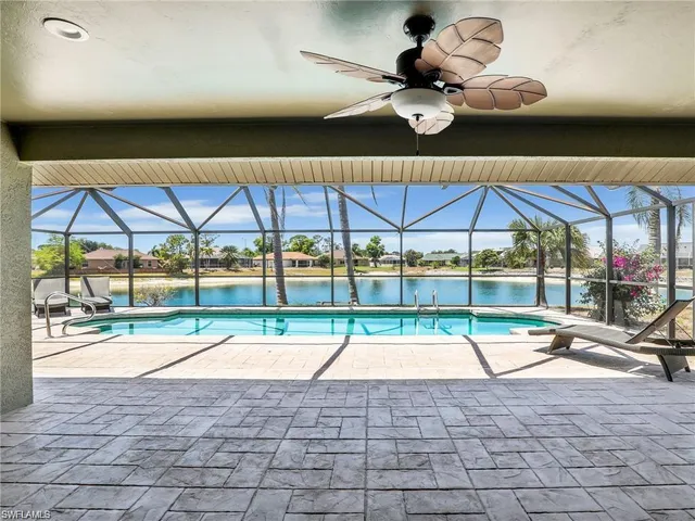 a view of pool with a patio