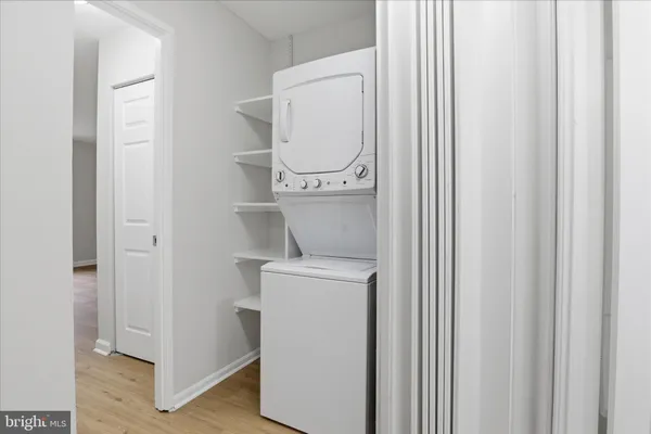 a view of a room with a washer and dryer