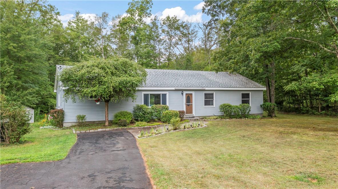 251 Vernal Butler Road Cairo, NY 12413 - Photo 1 of 1 a view of a yard in front of a house with large trees
