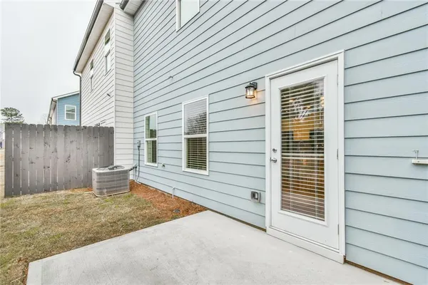 a view of a back yard of the house