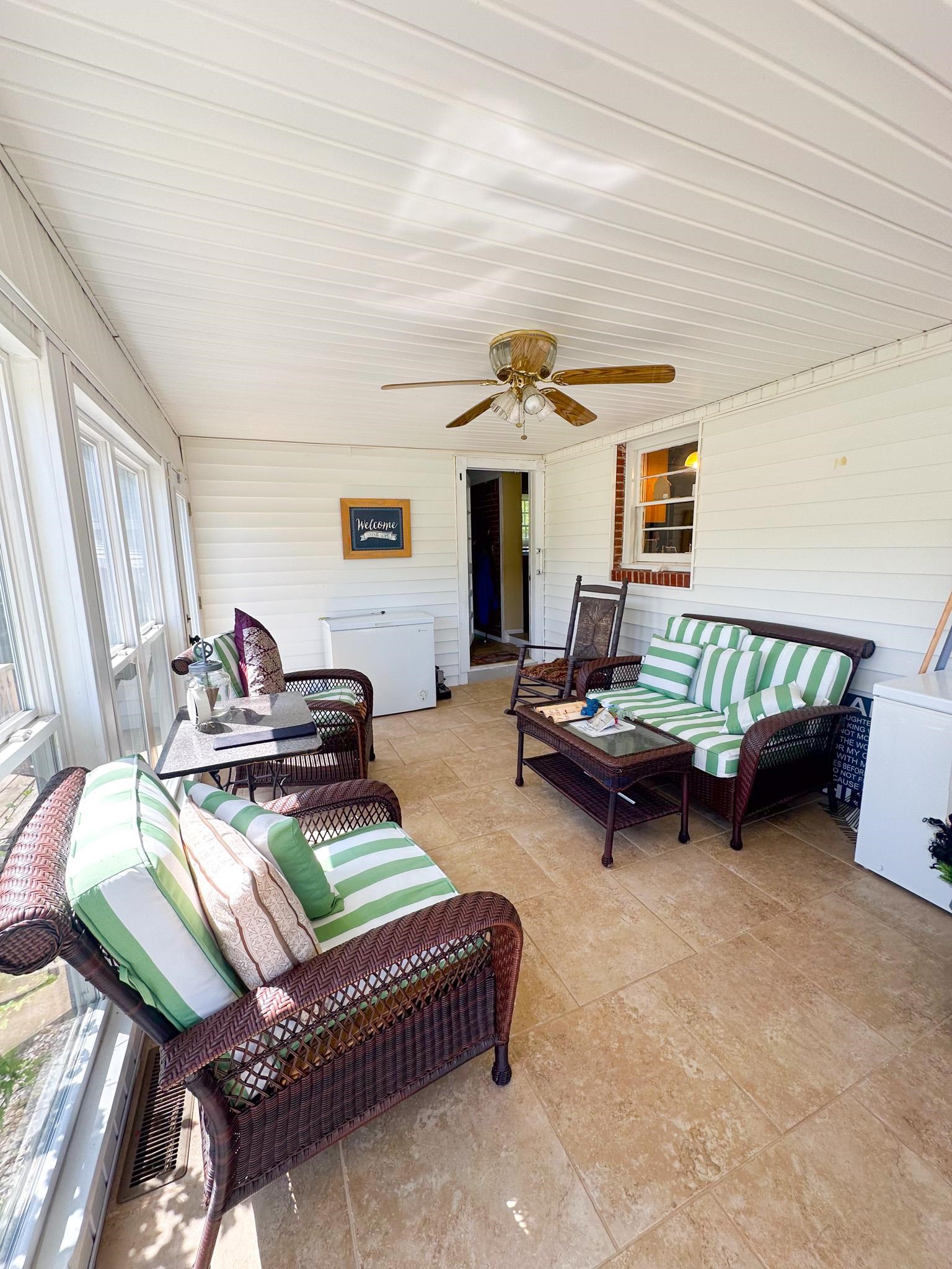 1650 6th Street Cherokee, AL 35616 - Photo 4 of 12 a living room with furniture and a wooden floor