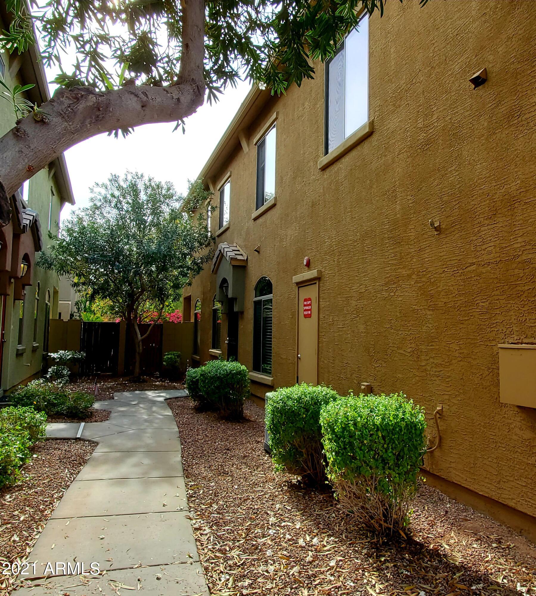 2150 East Bell Road, Unit 1108 Phoenix, AZ 85022 - Photo 5 of 13 Walkway to Front Door