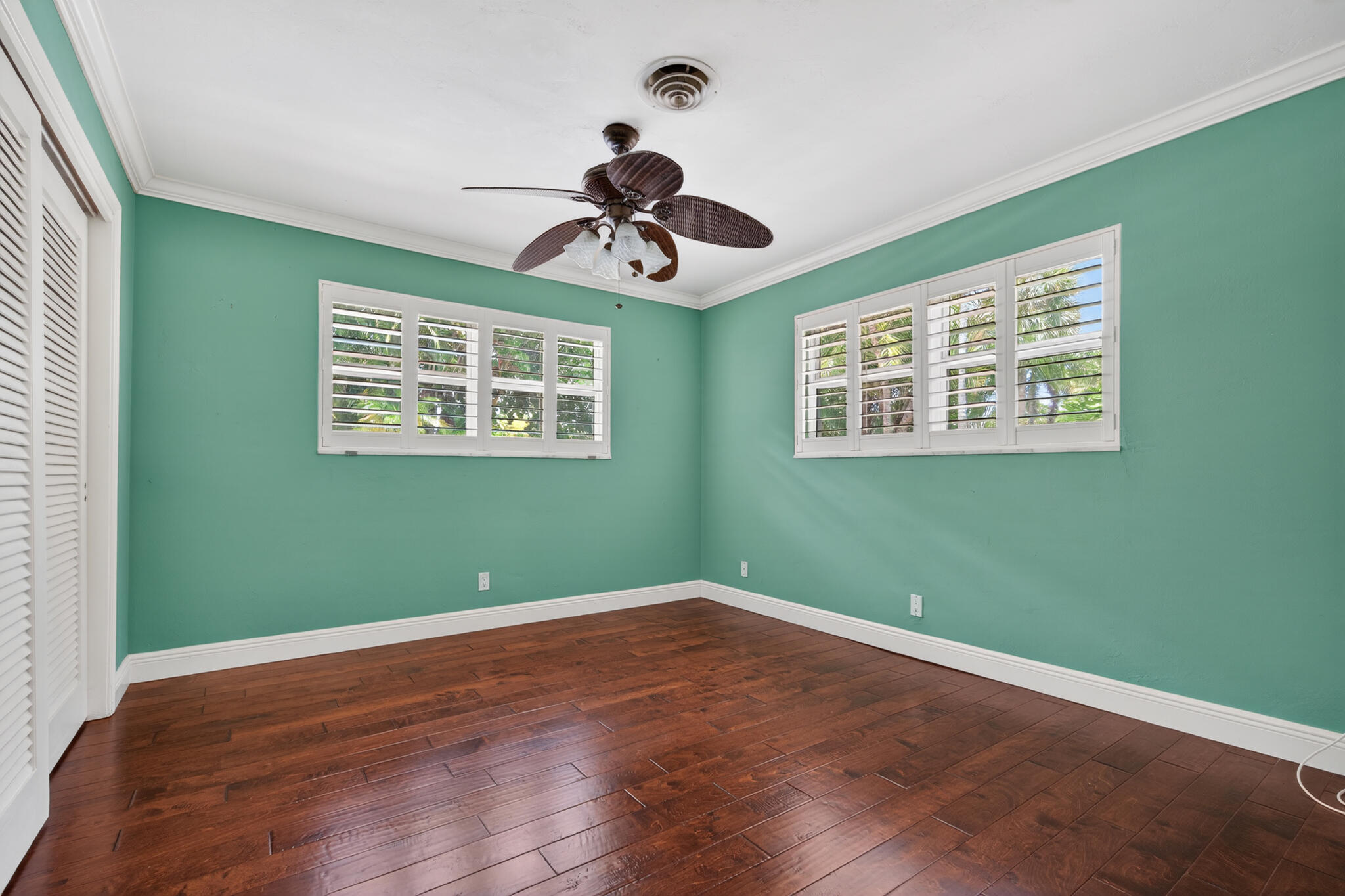 701 Southwest 5th Street Boca Raton, FL 33486 - Photo 16 of 19 a view of a room with window wooden floor and windows