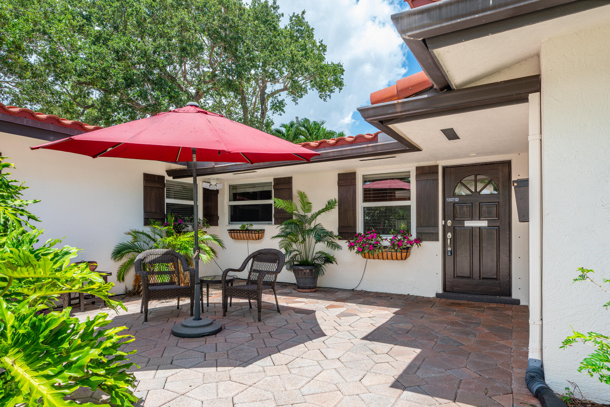 701 Southwest 5th Street Boca Raton, FL 33486 - Photo 3 of 19 a view of a house with sitting area