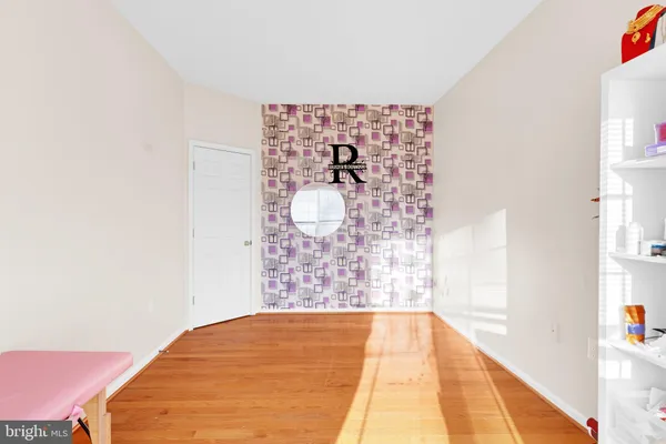 a view of a big room with windows