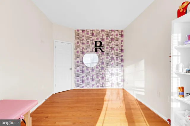 a view of a big room with windows