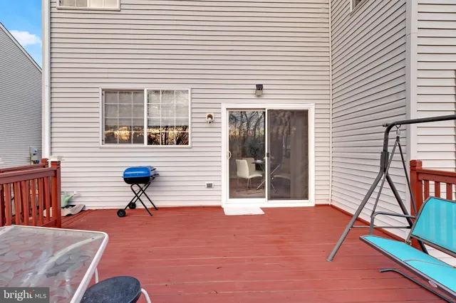 an aerial view of a house with a swimming pool
