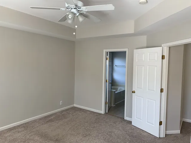 a bathroom with a tub and shower