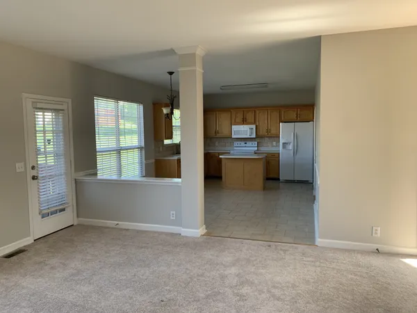 a room with a stove and a window