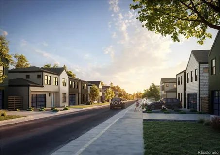 a view of multiple houses with a street