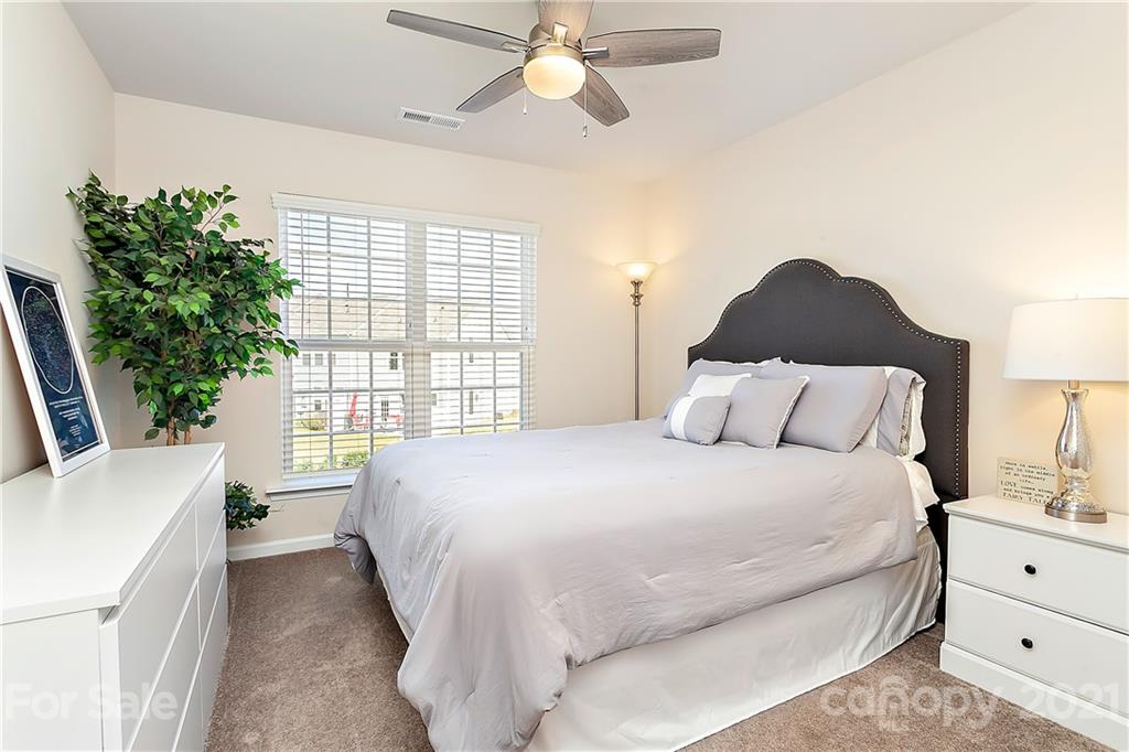 501 Hunters Dance Road Fort Mill, SC 29708 - Photo 12 of 16 a bed room with a bed and a window