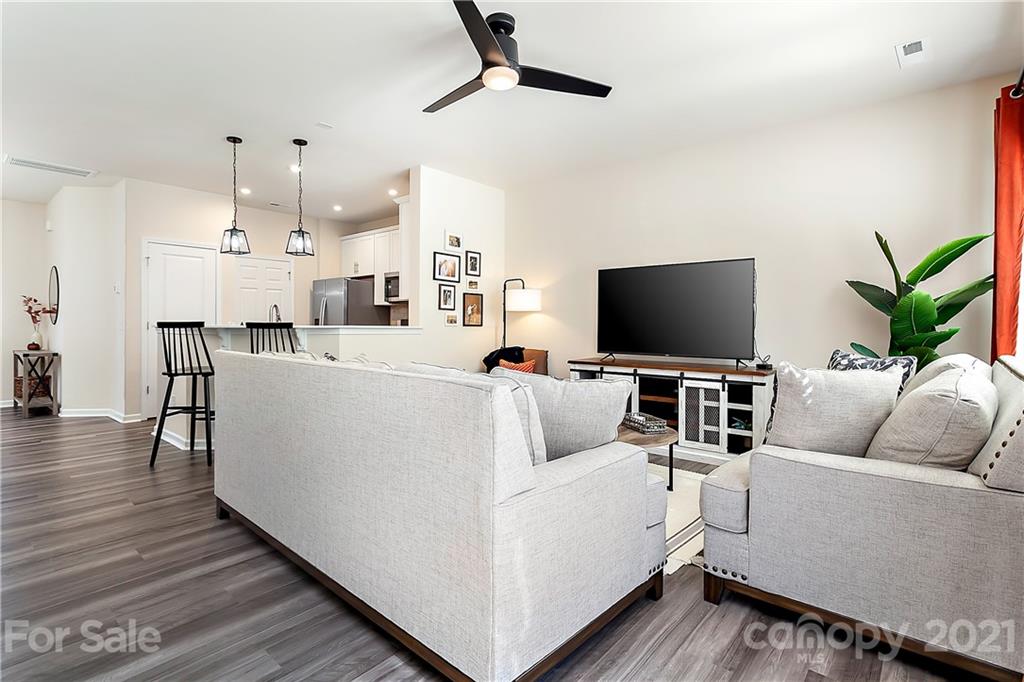 501 Hunters Dance Road Fort Mill, SC 29708 - Photo 5 of 16 a living room with furniture and a flat screen tv