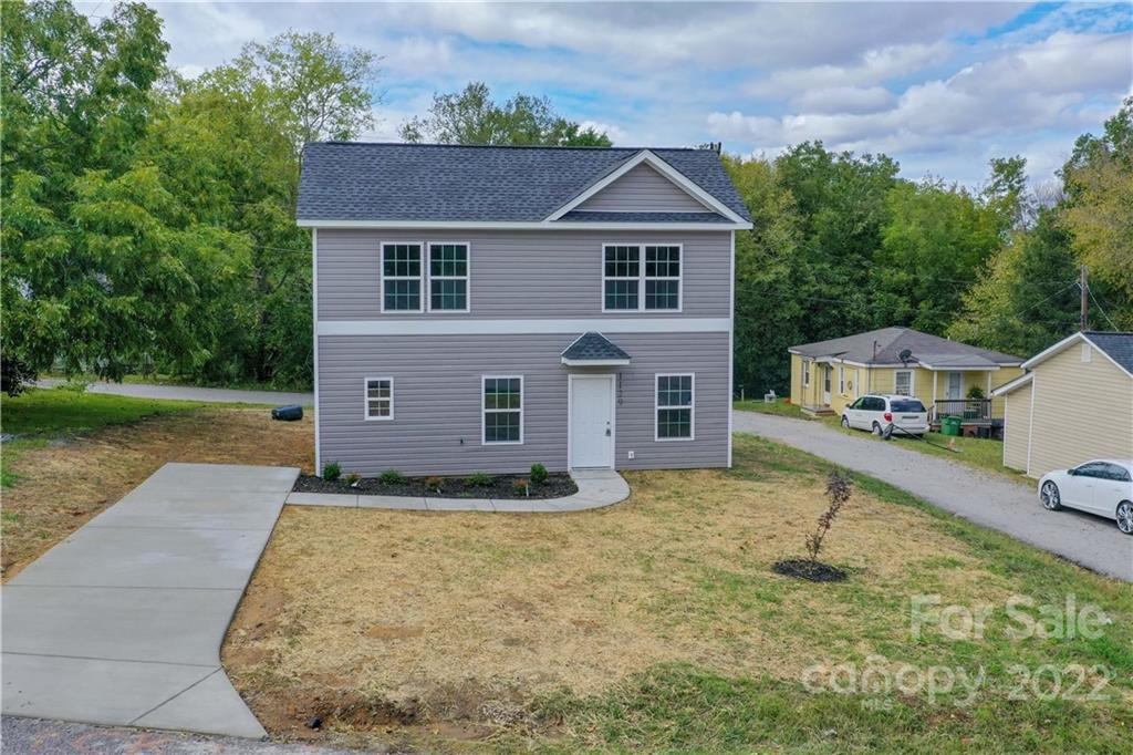 1129 5th Street Lancaster, SC 29720 - Photo 1 of 37 a front view of a house with yard