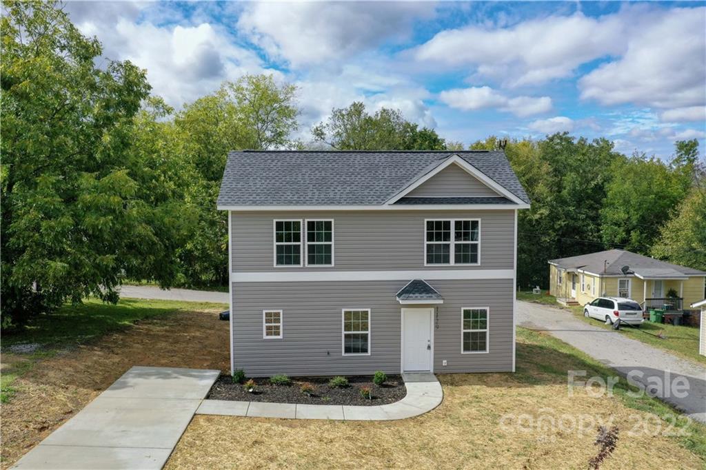 1129 5th Street Lancaster, SC 29720 - Photo 2 of 37 a front view of a house with a yard