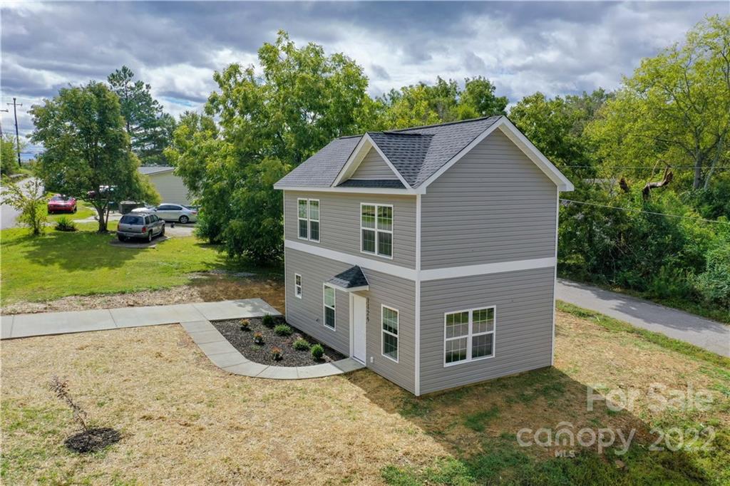 1129 5th Street Lancaster, SC 29720 - Photo 35 of 37 a front view of a house with garden