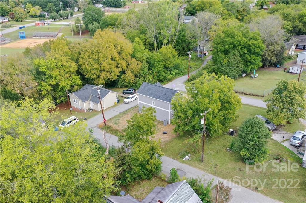 1129 5th Street Lancaster, SC 29720 - Photo 37 of 37 an aerial view of residential house with outdoor space and lake view