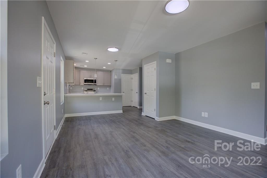 1129 5th Street Lancaster, SC 29720 - Photo 9 of 37 a view of kitchen with wooden floor