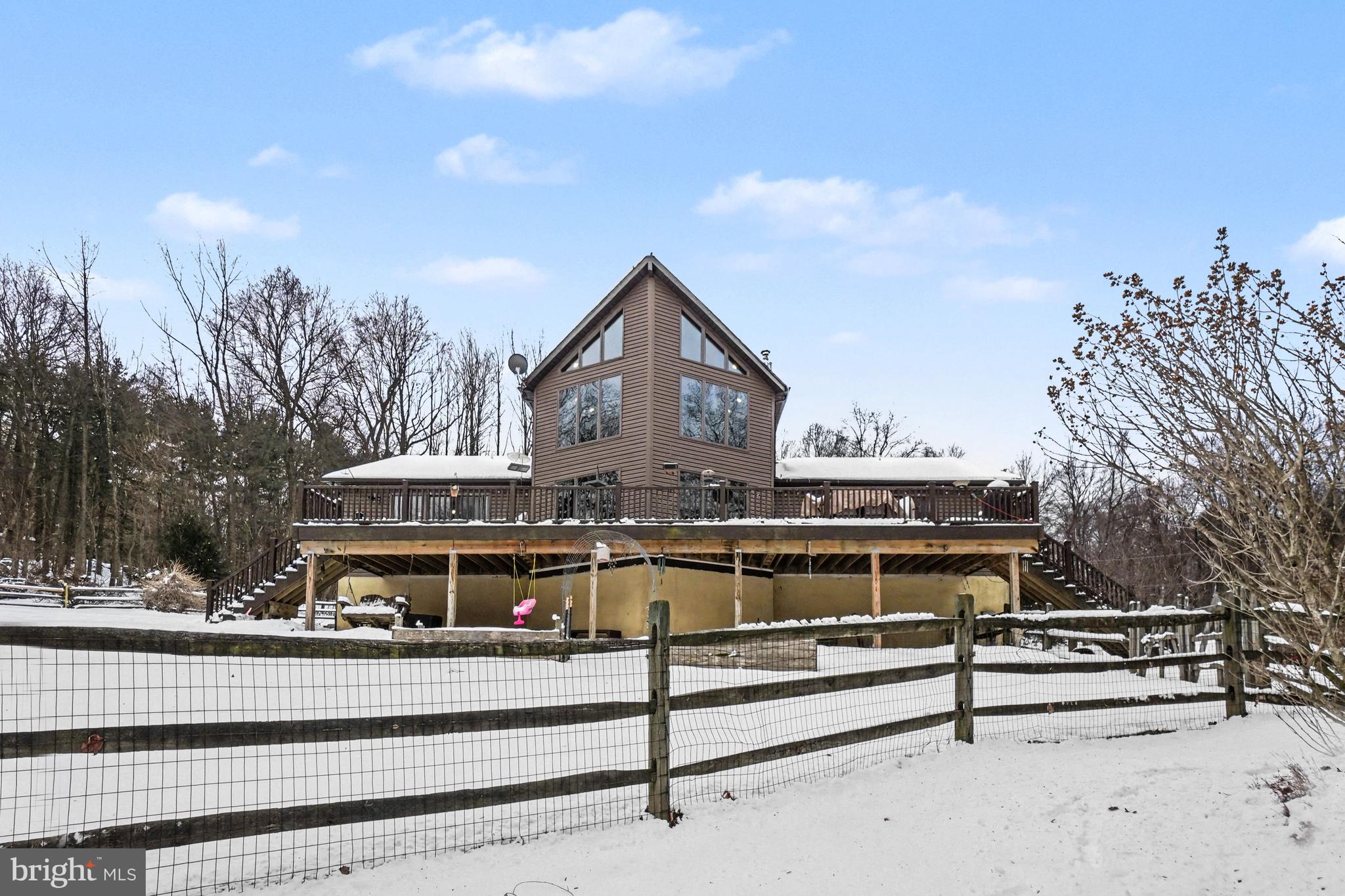 46 Wetzel Road Macungie, PA 18062 - Photo 29 of 42 a view of a big building with a big yard and large trees