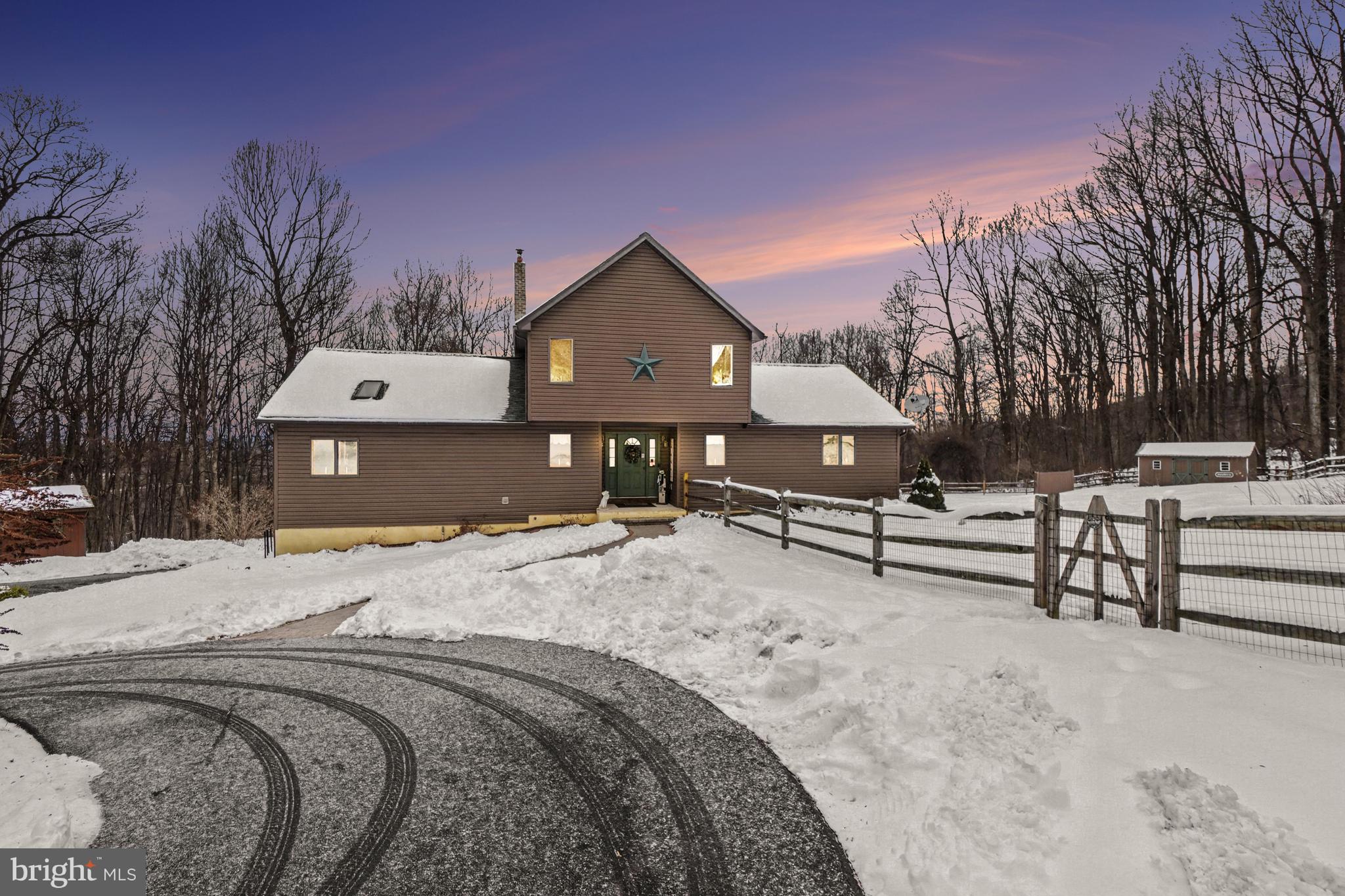 46 Wetzel Road Macungie, PA 18062 - Photo 3 of 42 a view of a house with a bed and wooden fence