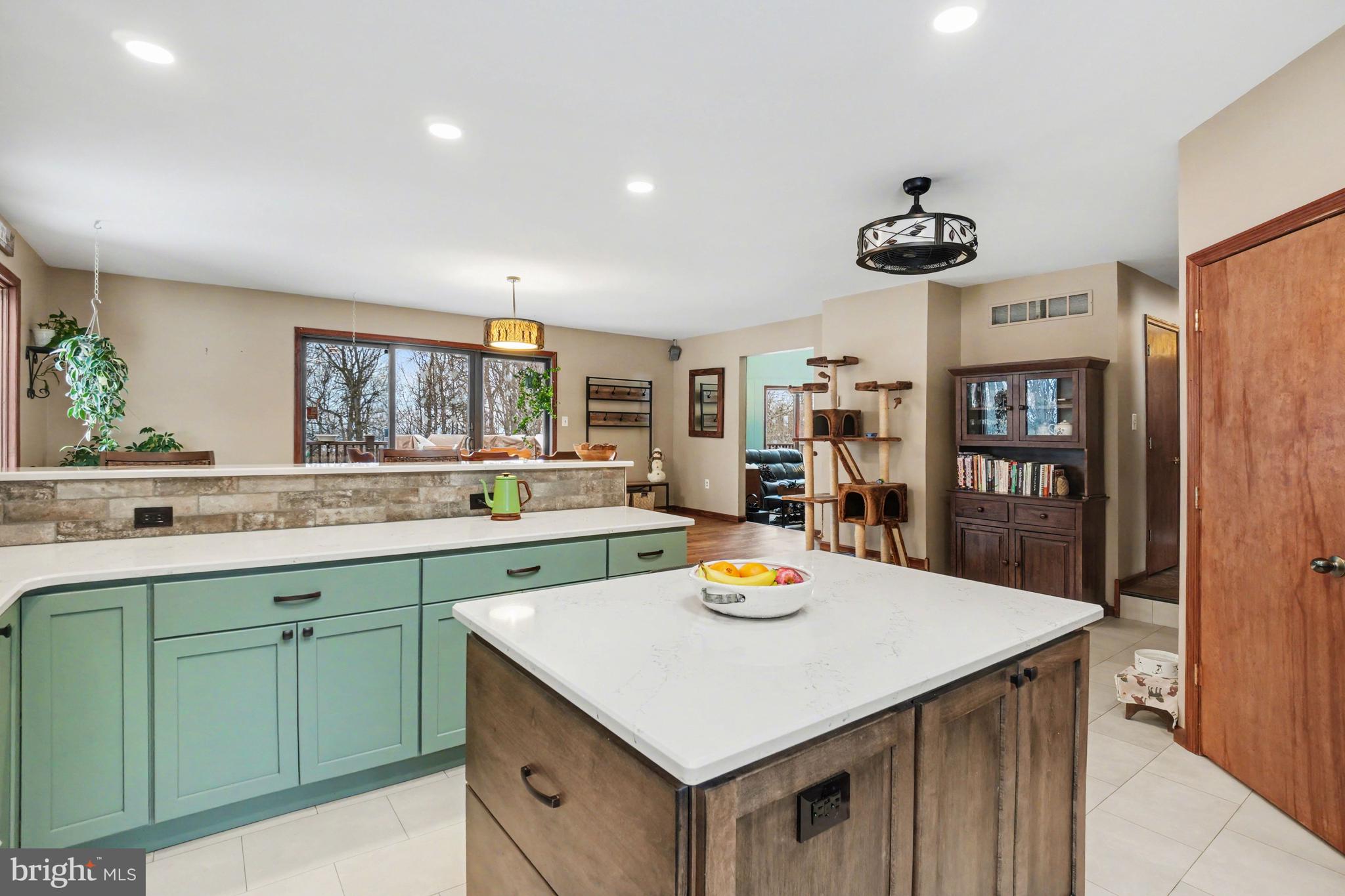 46 Wetzel Road Macungie, PA 18062 - Photo 8 of 42 a kitchen with a sink cabinets and wooden floor
