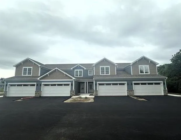 a view of house with yard