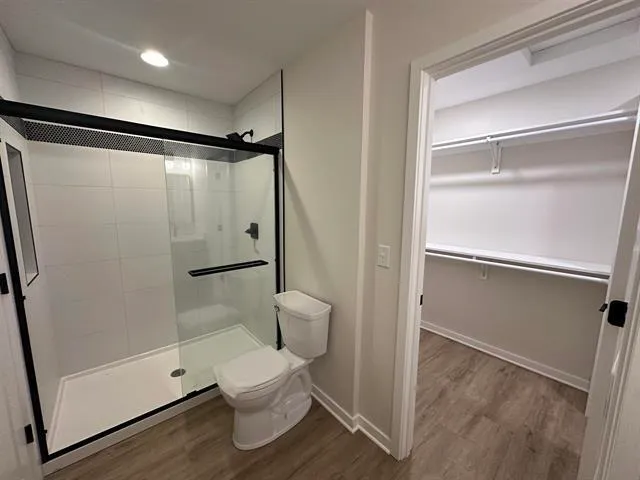 a view of an empty walk in closet