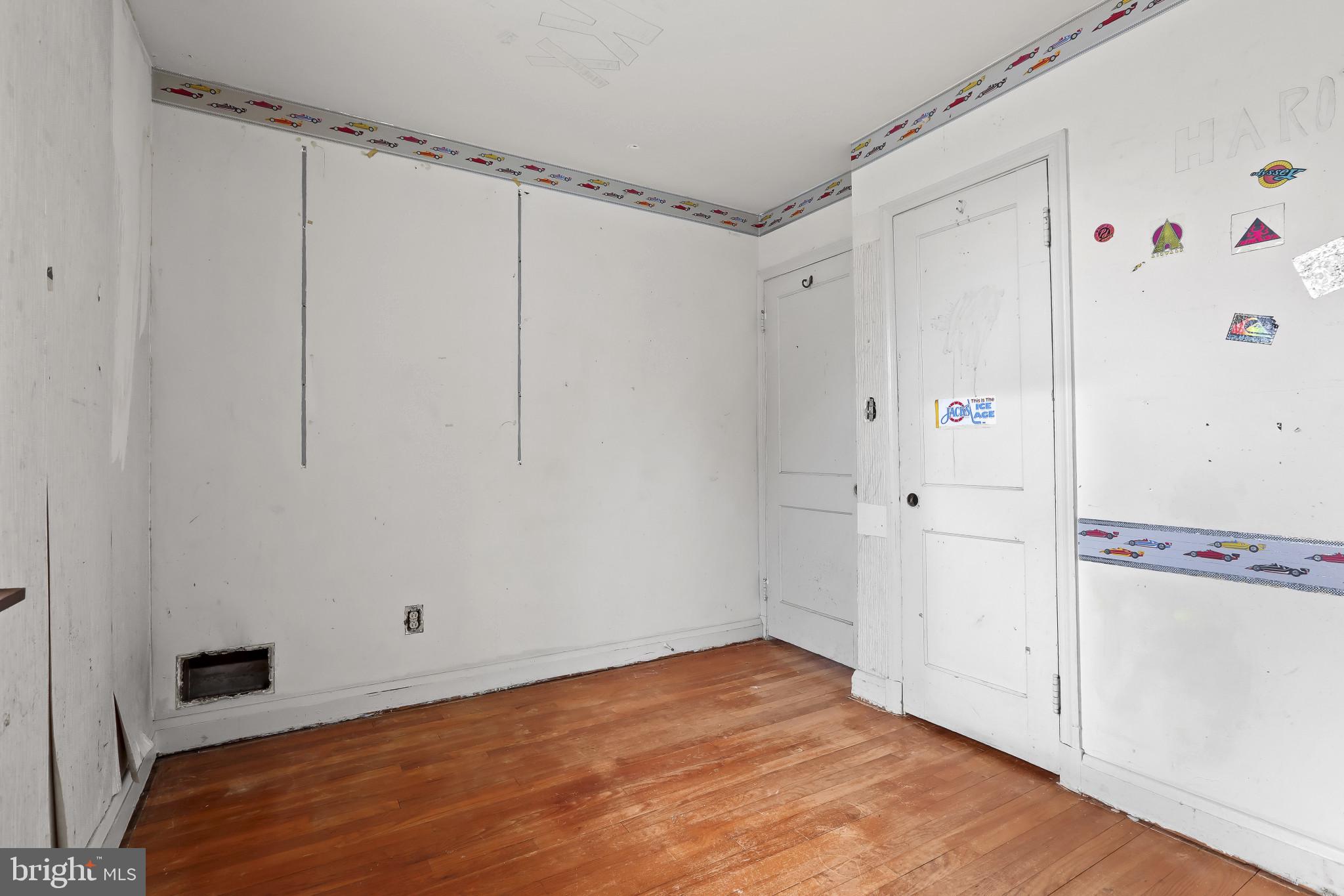 409 Oak Court Baltimore, MD 21228 - Photo 11 of 29 a view of a room with cabinet and hardwood floor