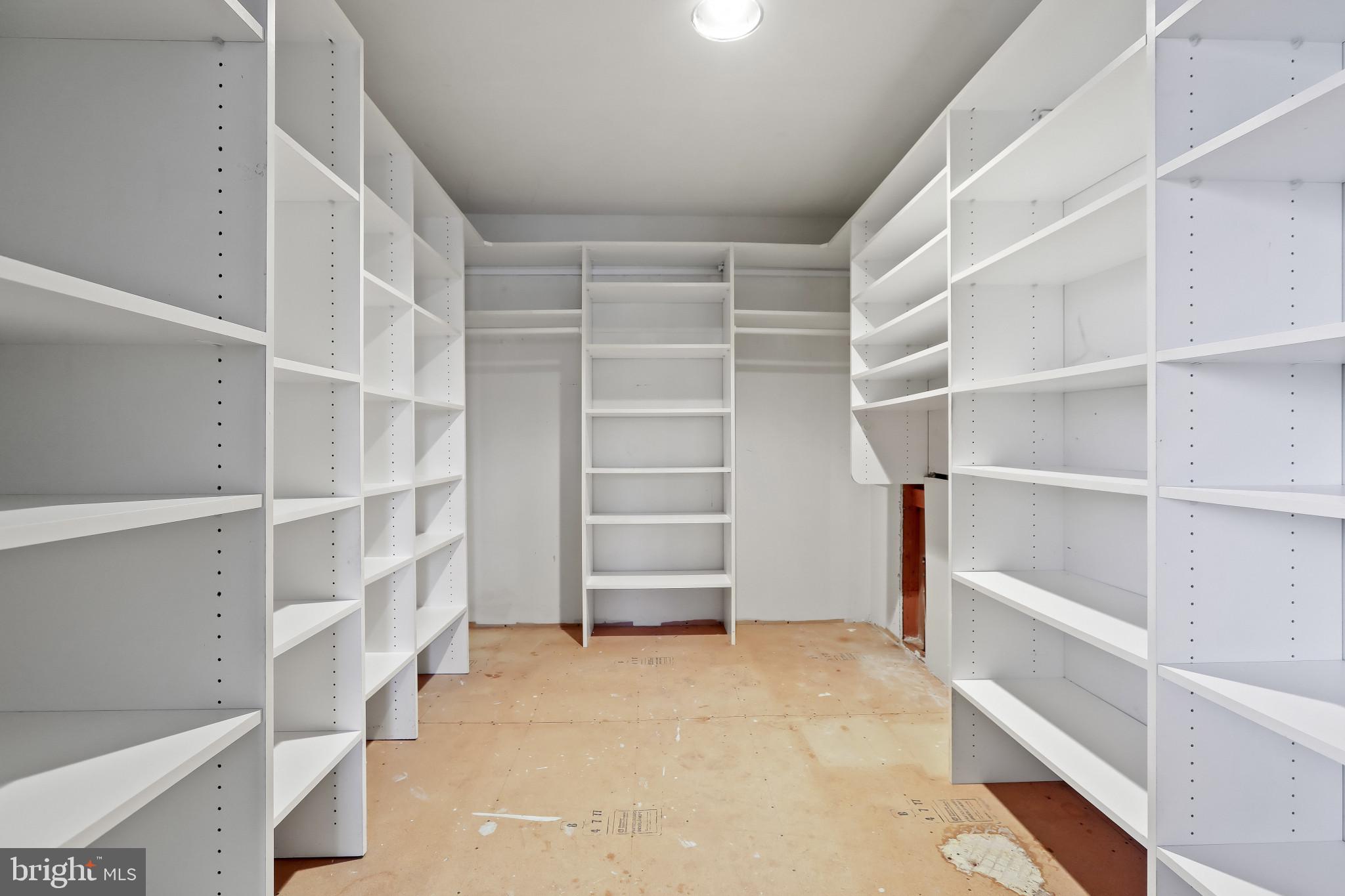 409 Oak Court Baltimore, MD 21228 - Photo 15 of 29 a view of an empty walk in closet