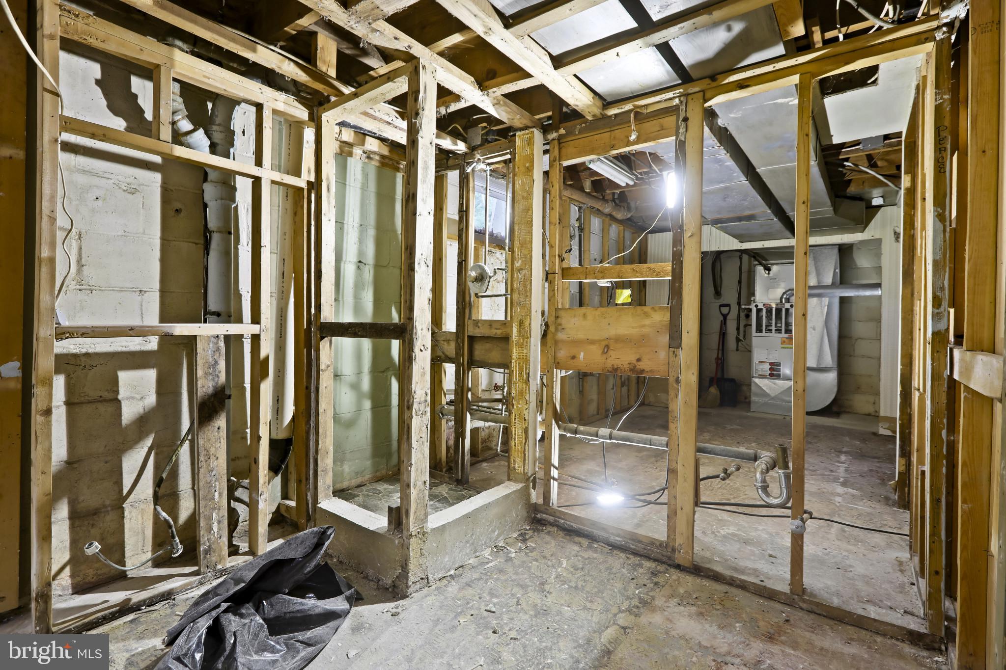 409 Oak Court Baltimore, MD 21228 - Photo 23 of 29 a view of an empty room with glass door