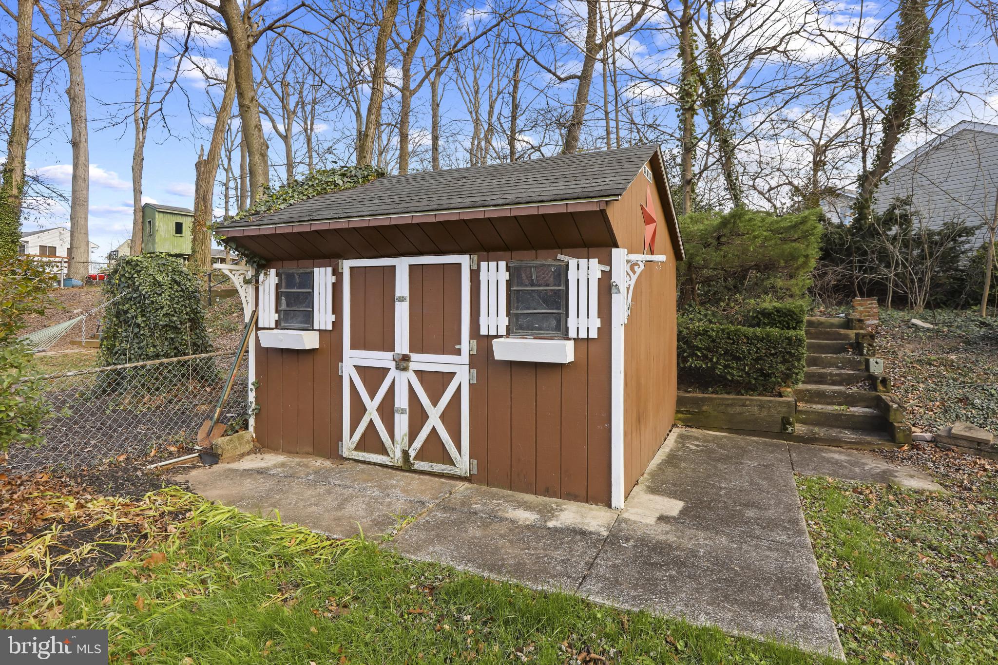 409 Oak Court Baltimore, MD 21228 - Photo 28 of 29 a front view of a house with a yard