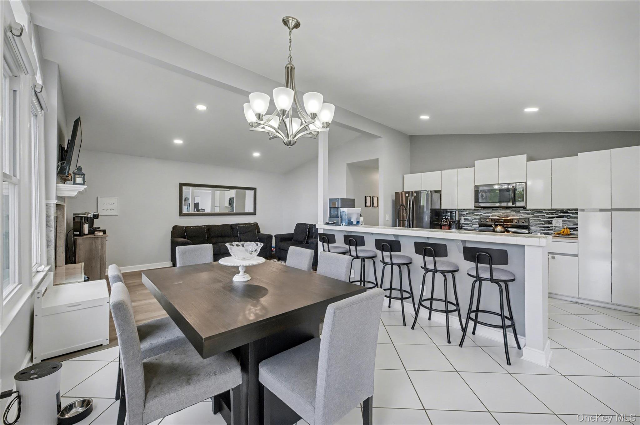 1298 Pulaski Road East Northport, NY 11731 - Photo 13 of 41 a view of a dining room with furniture