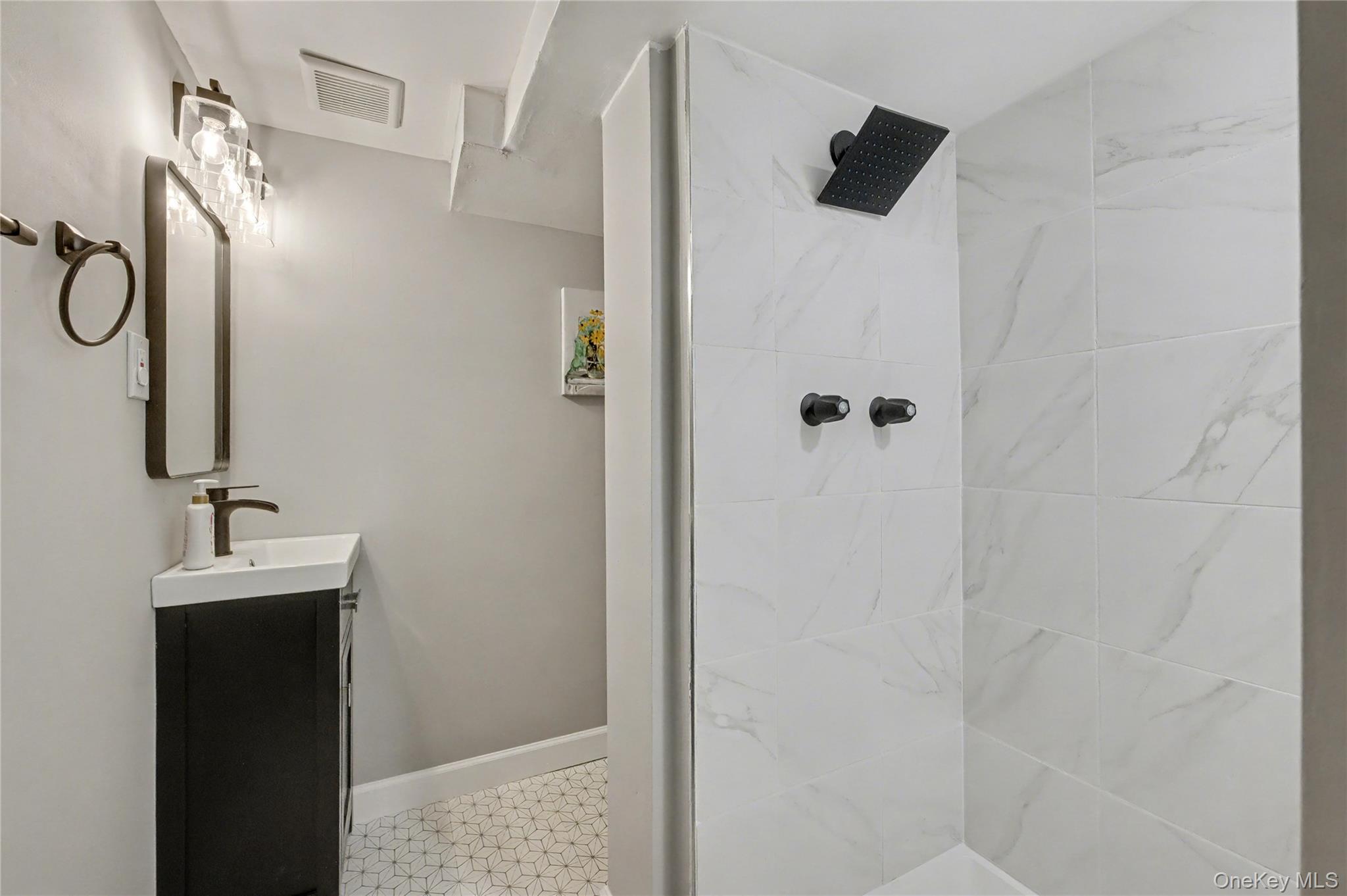 1298 Pulaski Road East Northport, NY 11731 - Photo 33 of 41 a bathroom with a shower and mirror