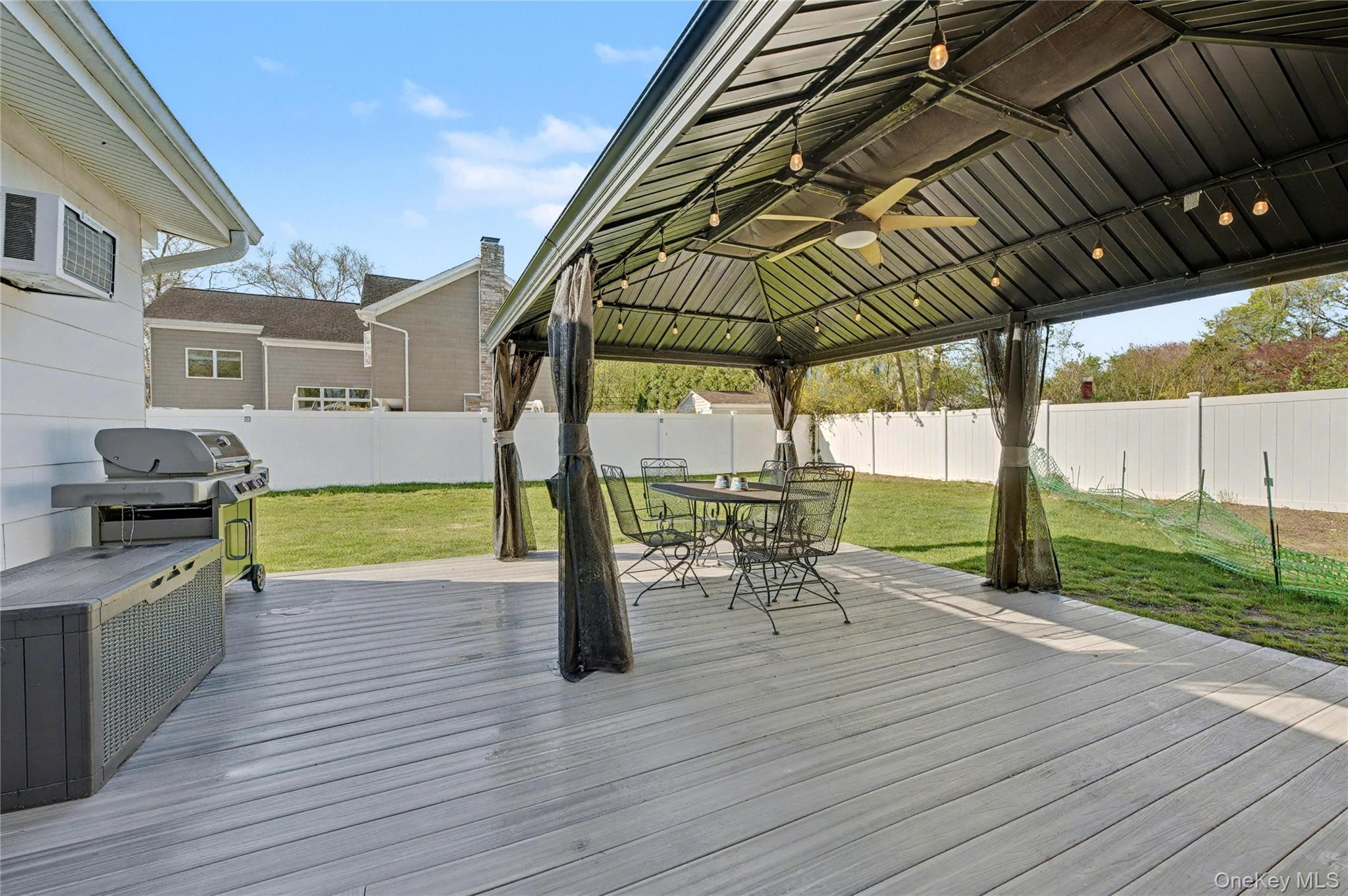 1298 Pulaski Road East Northport, NY 11731 - Photo 39 of 41 a view of a swimming pool with a patio