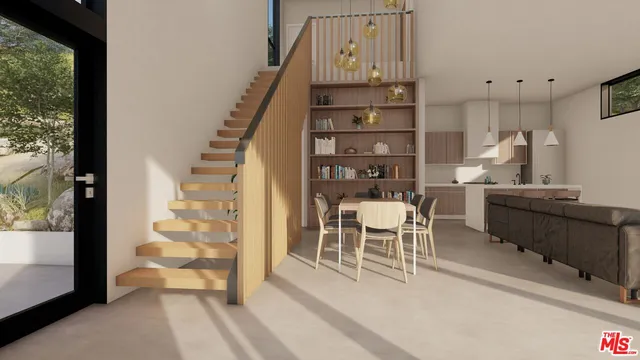 a dining room with furniture and wooden floor