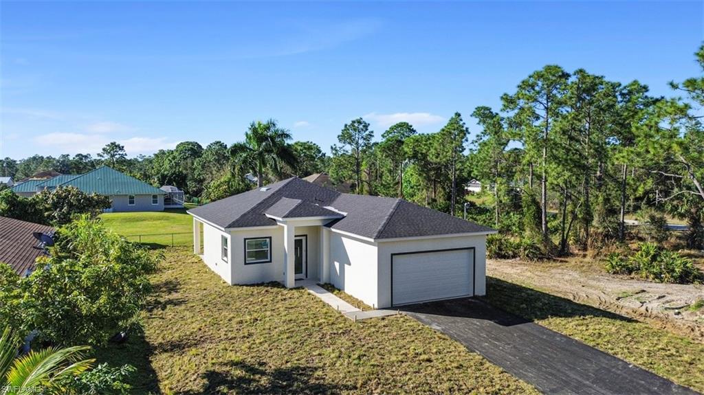 506 Trinity Street East Lehigh Acres, FL 33974 - Photo 1 of 20