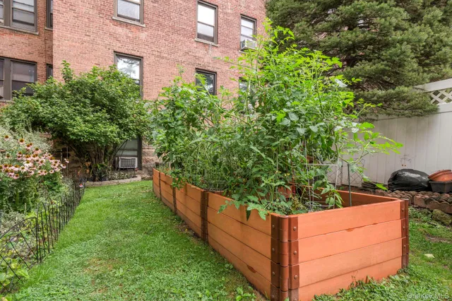 an aerial view of a house with a garden