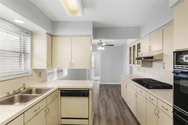 a bathroom with a sink and a window