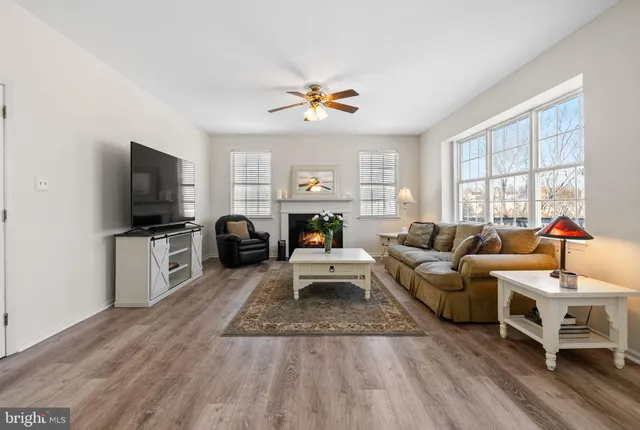 a bathroom with a toilet a sink and a mirror