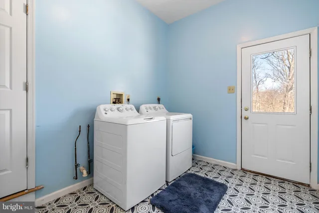 a view of a hallway with a door