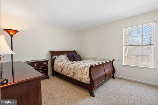 a workspace with furniture and a window