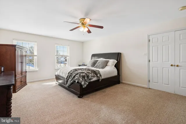 a bathroom with a double vanity sink mirror and