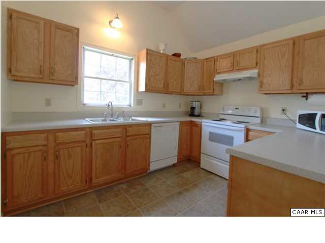 210 Moore Road Ruckersville, VA 22968 - Photo 11 of 18 a kitchen with sink and cabinets