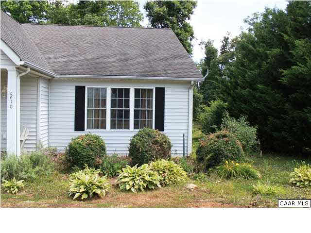 210 Moore Road Ruckersville, VA 22968 - Photo 3 of 18 a view of a backyard with plants