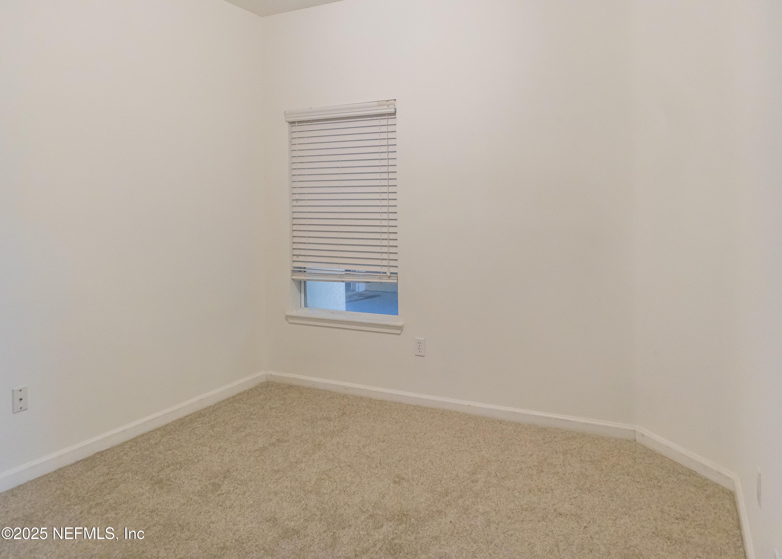 3680 Kirkpatrick Circle, Unit 5 Jacksonville, FL 32210 - Photo 5 of 10 a view of a small space with a window