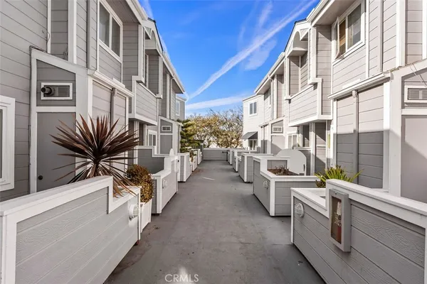 a view of a building with outdoor seating