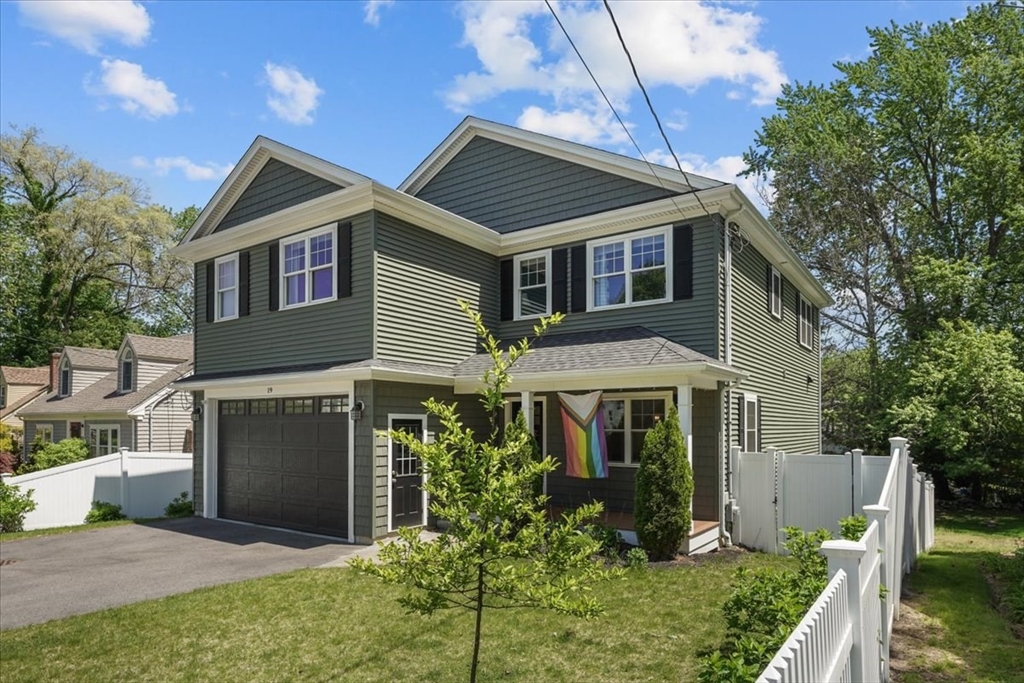 19 Baldwin Road Waltham, MA 02452 - Photo 1 of 1 a front view of a house with garden