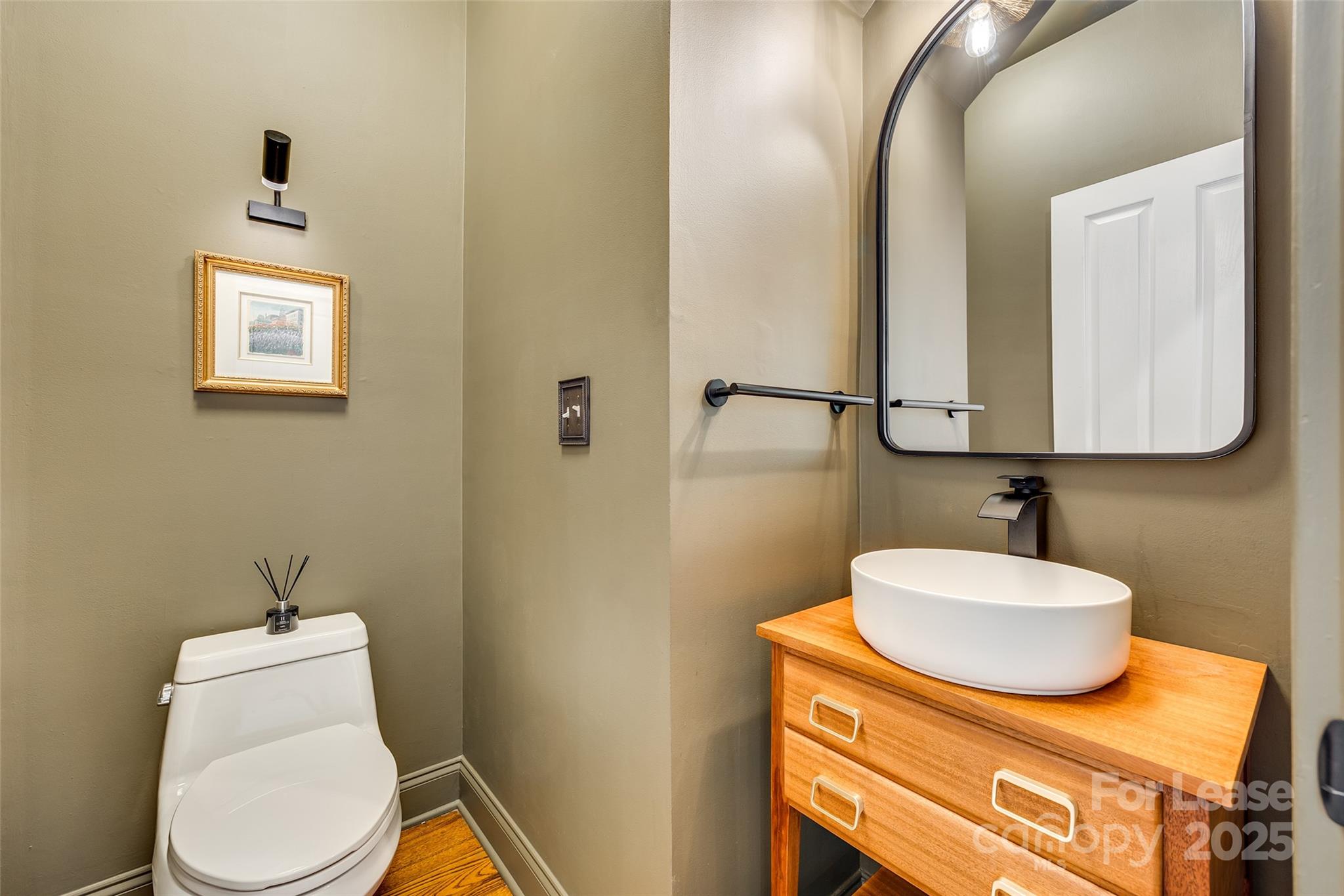 1128 Windsong Bay Lane Fort Mill, SC 29708 - Photo 15 of 35 a bathroom with a toilet sink and mirror